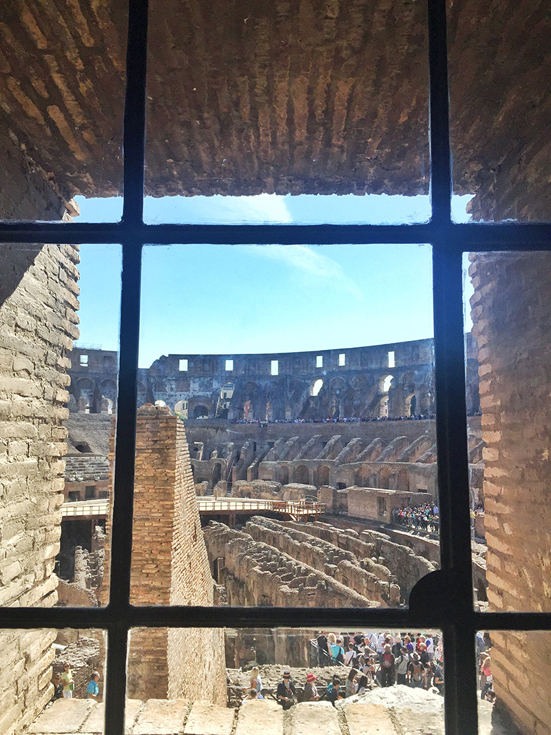window peeking into the coliseum 